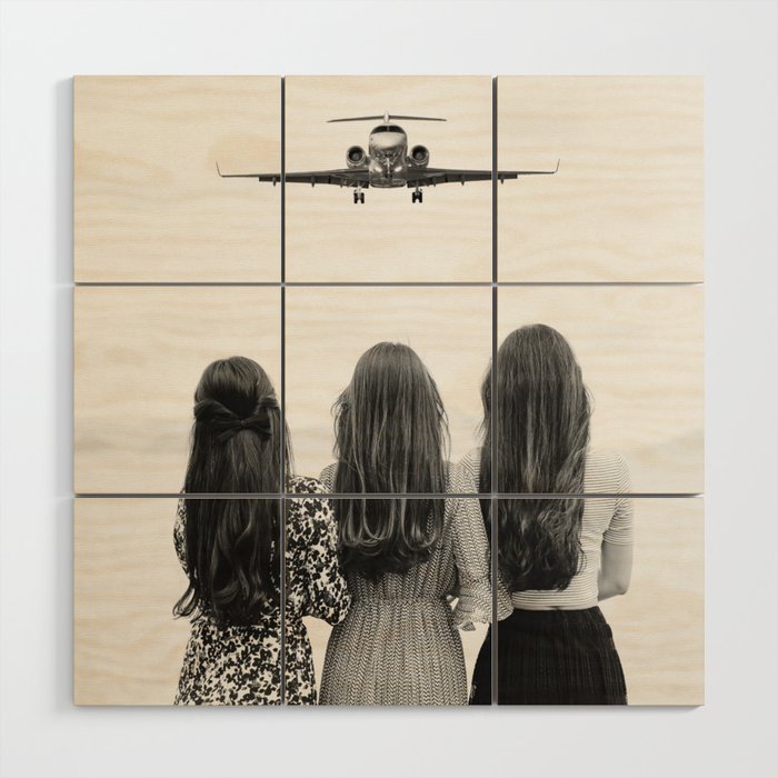 Sisters stand united II; airplane coming in for a landing head on at three women sisterhood girl power black and white photograph - photography - photographs Wood Wall Art