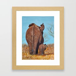 Mother and Baby Elephant Butts Walking Away Framed Art Print