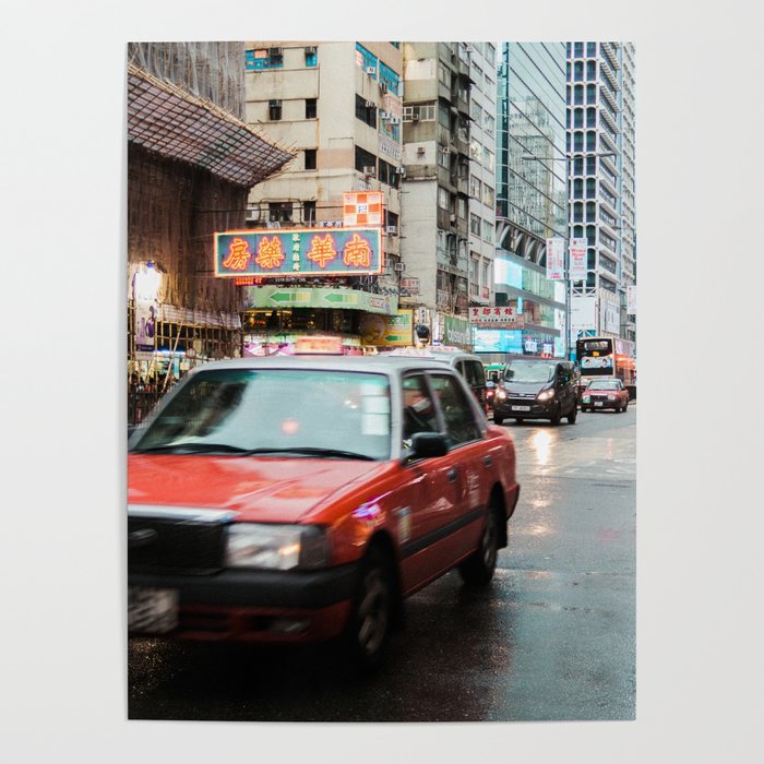 Taxi in Hong Kong driving through the streets of Mong Kok Poster