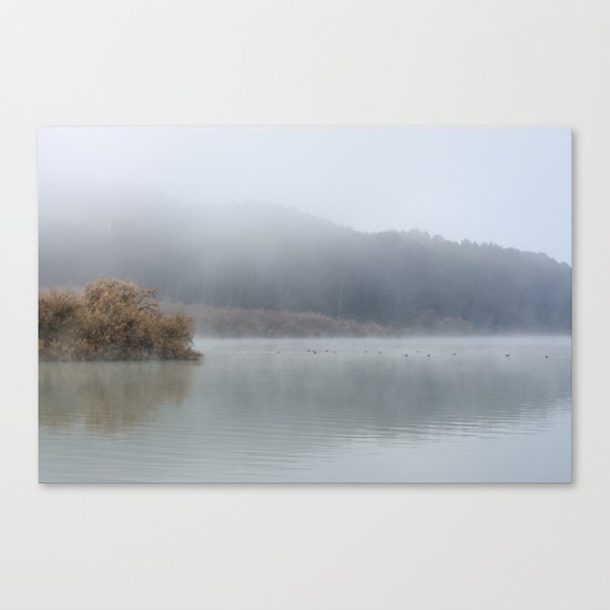 Wilderness lake. Foggy sunrise Canvas Print