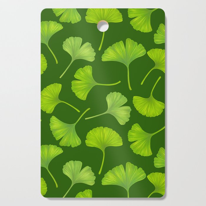 Ginkgo leaves on dark green Cutting Board