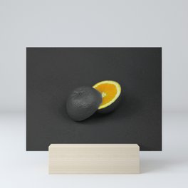 Black matt orange fruit juice Mini Art Print