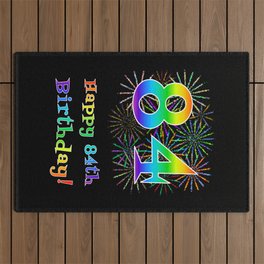 [ Thumbnail: 84th Birthday - Fun Rainbow Spectrum Gradient Pattern Text, Bursting Fireworks Inspired Background Outdoor Rug ]