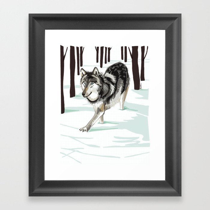 Wolf in the snow Framed Art Print