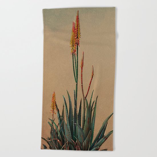 Blooming succulent. Beach Towel
