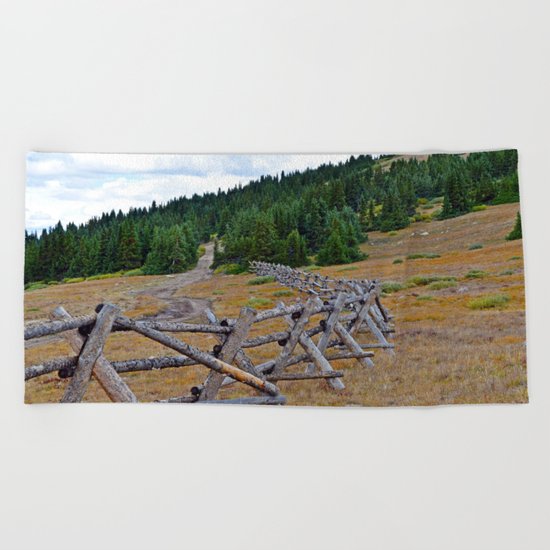 Fenceline in the fall Beach Towel
