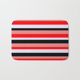 [ Thumbnail: Light Coral, Red, Lavender & Black Colored Stripes/Lines Pattern Bath Mat ]