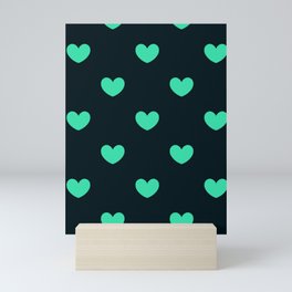 Turquoise pop hearts on navy Mini Art Print