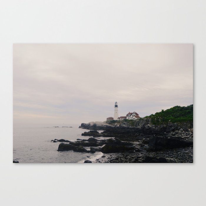 Lighthouse on the coast Canvas Print