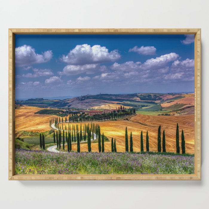Cypress trees and meadow with typical tuscan house Serving Tray