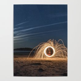 Fire spinning as the moon rises on GHB Poster