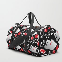 Cards, Dice and Casino Chips on Black Duffle Bag