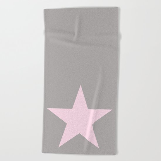Pink star on grey background Beach Towel