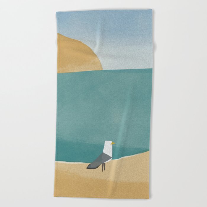 Lone seagull by the beach Beach Towel