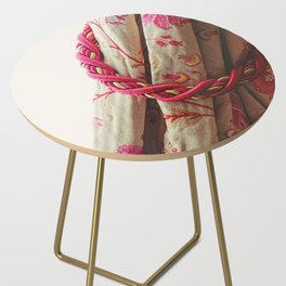 Medieval castle life | Floral pattern on curtains, pink and gold tie backs  Side Table