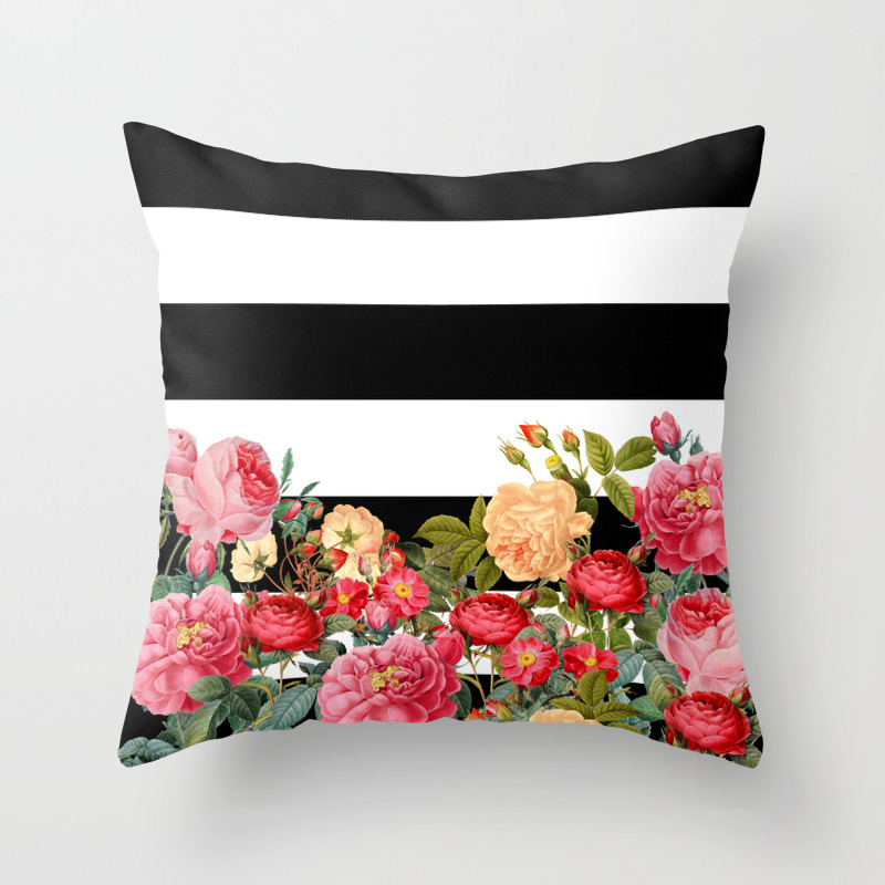 black floral throw pillow