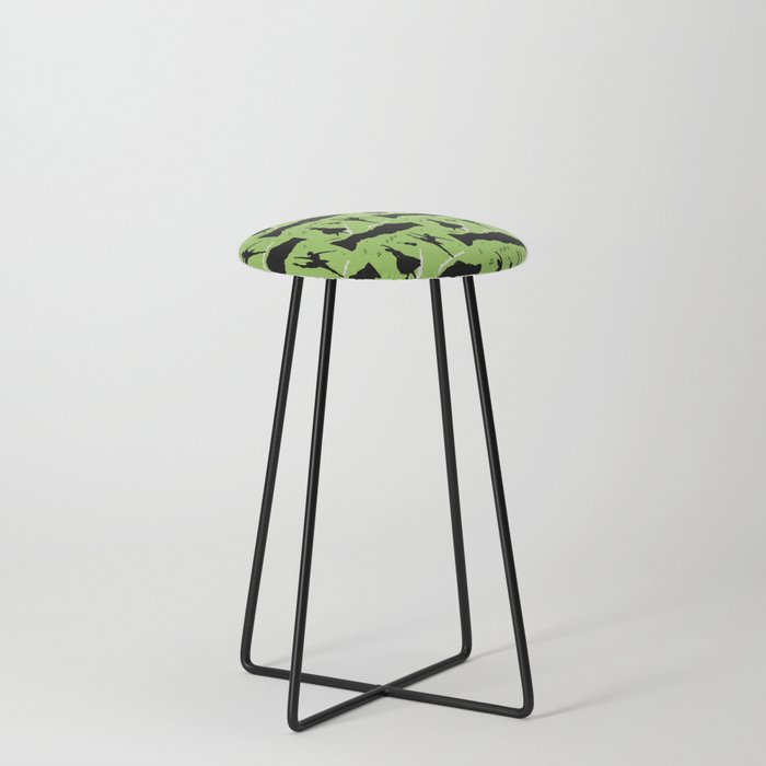 Two ballerina figures in black on green paper Counter Stool