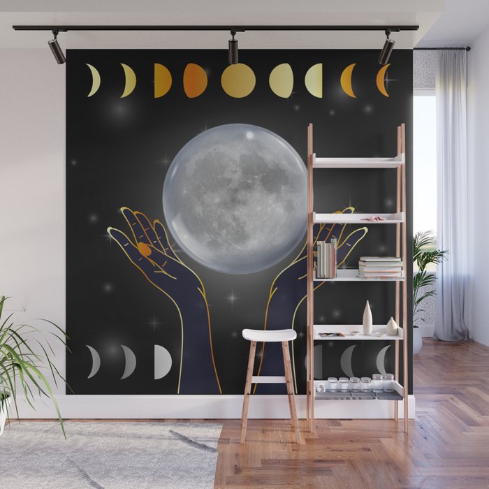 Hands holding the full moon on a starry background with moon phases Wall Mural