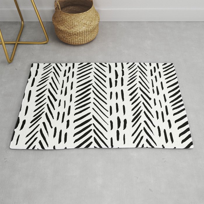 Abstract herringbone pattern - black and white Rug