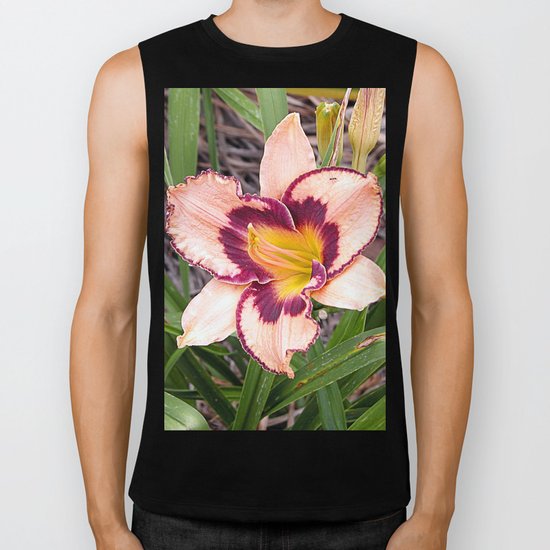 Pink daylily growing in Queensland Biker Tank