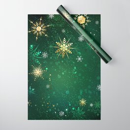 Gold Snowflakes on a Green Background Wrapping Paper