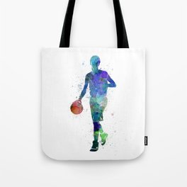 one young man basketball player dribbling silhouette in studio isolated on white background Tote Bag