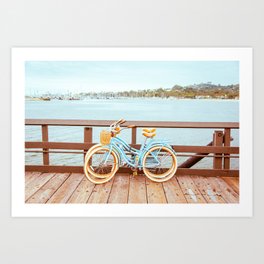 Two retro bicycles standing on Santa Barbara pier, California, USA. Vintage filter with muted teal blue and orange colors. Art Print