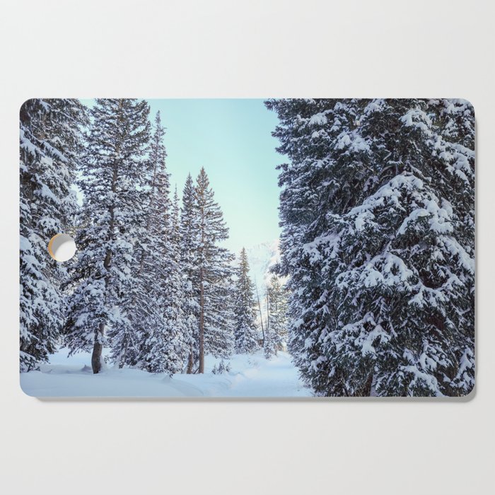 Path Through Snow Covered Trees Cutting Board