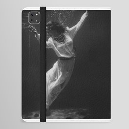 Underwater view of a women, wearing a long gown, floating in water collage fashion and glamour photography / photographs by Toni Frissell iPad Folio Case