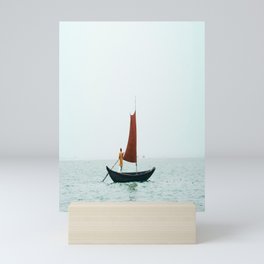 A Man Rowing A Small Boat With a Sail in Bangladesh Mini Art Print