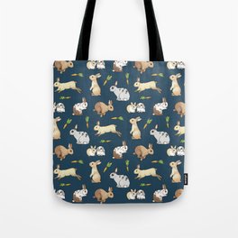 Rabbits on navy background Tote Bag