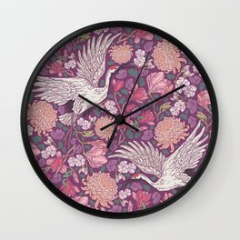 Cranes with chrysanthemums and pink magnolia on purple background Wall Clock