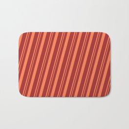[ Thumbnail: Brown and Coral Colored Pattern of Stripes Bath Mat ]
