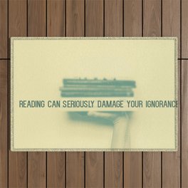 Reading can seriously damage your ignorance Outdoor Rug