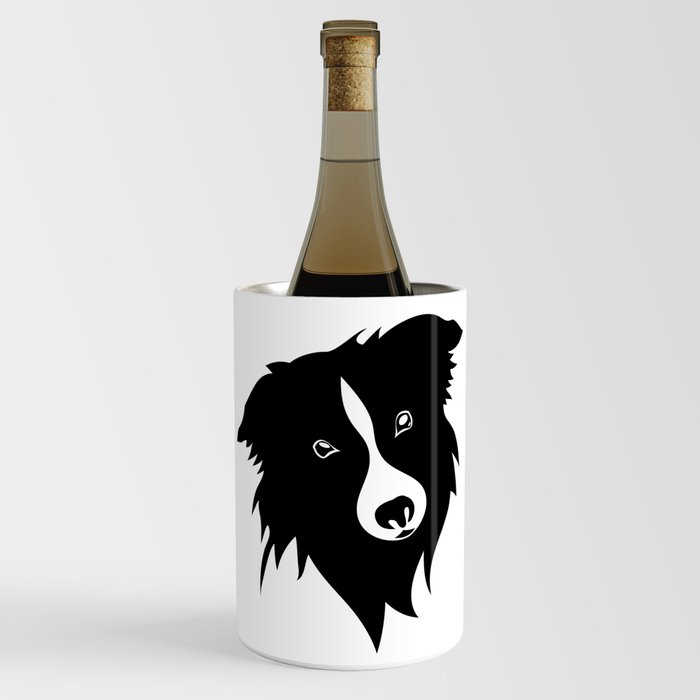 Portrait of a funny playful black and white border Collie puppy. A rough plan. Shepherd dog, smart friend black and white. Wine Chiller
