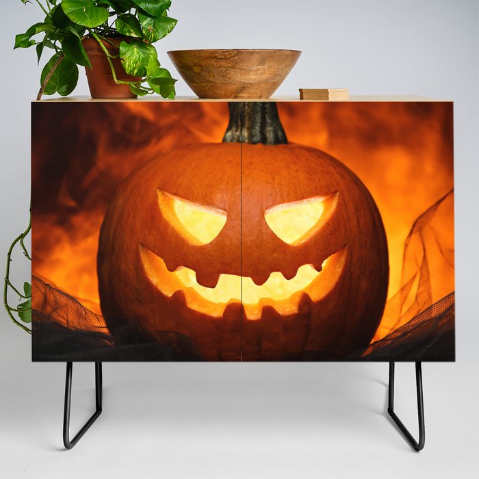 Carved Pumpkin for Halloween on Dark Background Credenza