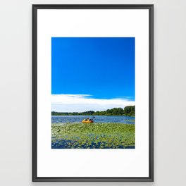 Peddling in the Waterlilies  Framed Art Print