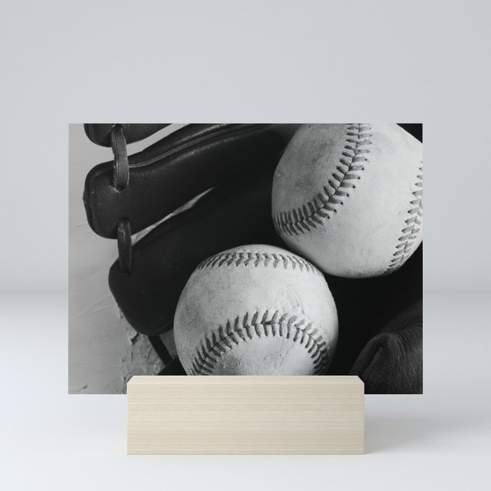 Old baseball equipment in black and white Mini Art Print