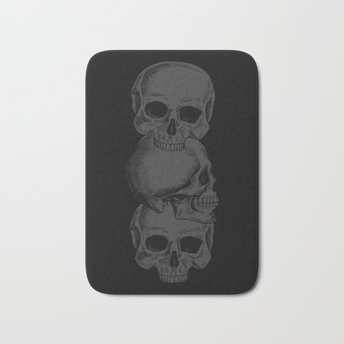 3 Black Skulls Stacked On Top of Each Other Bath Mat