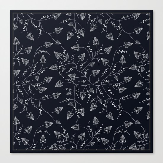 Delicate leaves on a black background . Canvas Print
