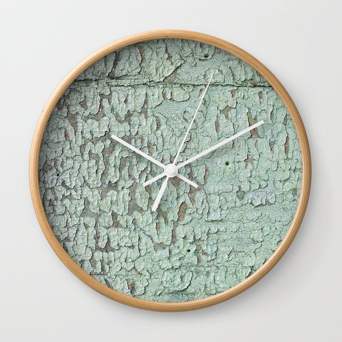 Part of wood with peeled green paint, abstract texture Wall Clock
