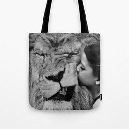 Grouchy Lion being kissed by brunette girl black and white photography Tote Bag