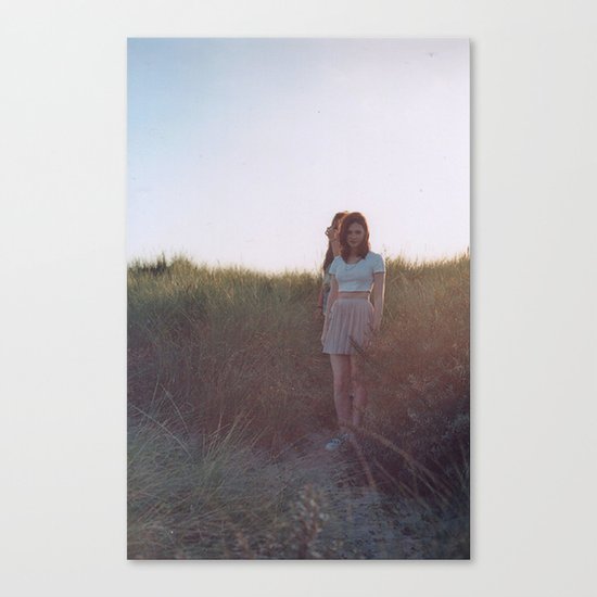 in the grass Canvas Print