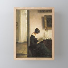 Woman on a Chair Reading Framed Mini Art Print