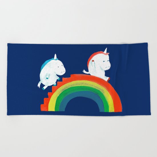 Unicorn on rainbow slide Beach Towel