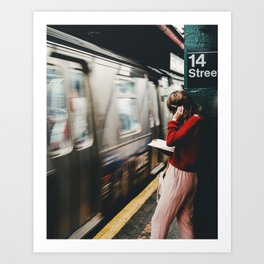 Young woman reading in New York’s subway Art Print