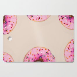 Donuts with pink frosting and sprinkles portrait art painting for kitchen, dining room, and home and wall decor Cutting Board