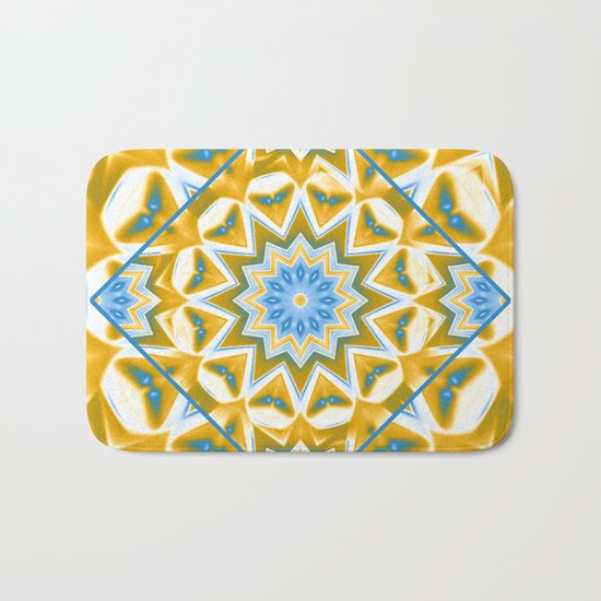 Wheel cover kaleidoscope in blue and gold Bath Mat