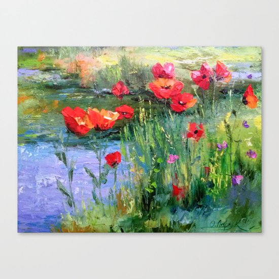Poppies in a field near a pond Canvas Print