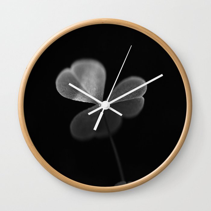 Oxalis in black and white Wall Clock